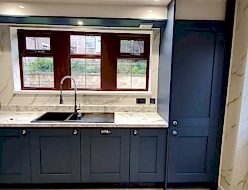 Kitchen with blue doors & cabinets