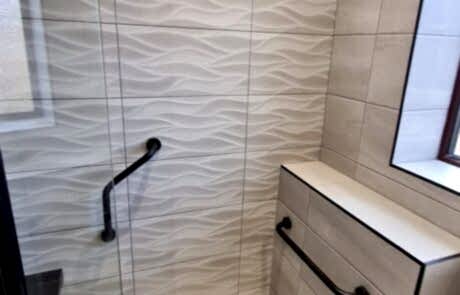 new bathroom with shower seat 12
