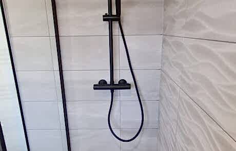 new bathroom with shower seat 3