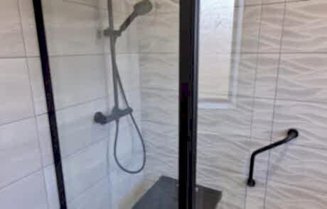 new bathroom with shower seat 4