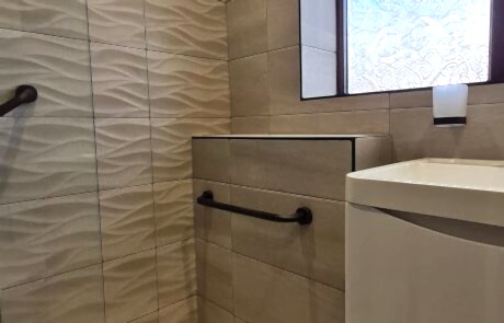 new bathroom with shower seat 9